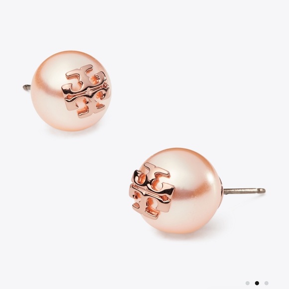 Rose gold Tory Burch pearl earrings.